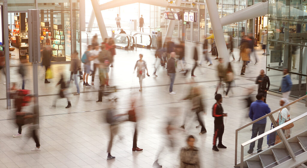 Blurred travelers and people in motion in Central Station or Air